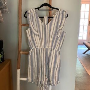 Never worn, blue pin striped romper. Size S.
